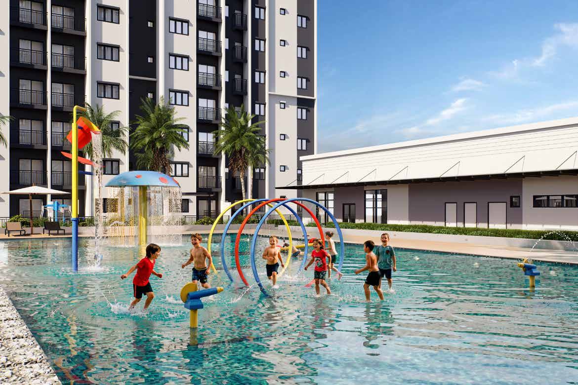 Children playing in the shallow water play lagoon